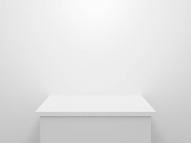 istock 3d exhibition stand. Blank podium isolated on white texture for presentation and exposition. Empty table background for display product. Pedestal table. Abstract interior stage design. 3d rendering. 1213233733