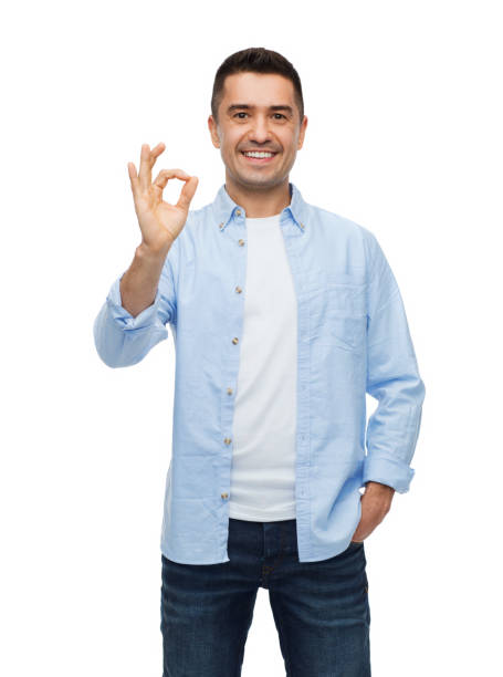 istock smiling man showing ok hand sign 1213235979