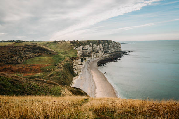 istock Cliffs and Beach scenes in Etretat Normandy France 1213236783