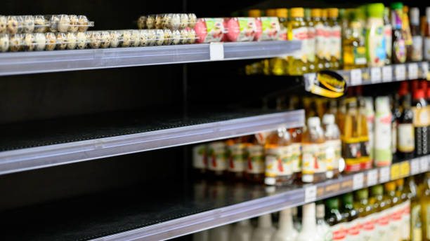 istock Empty shelves in a grocery store, Hoarding food 1213242182