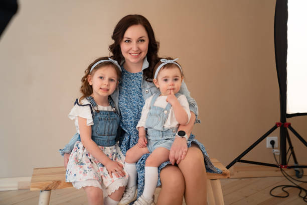 istock mother with daughters on photo shoots in Studio 1213242857
