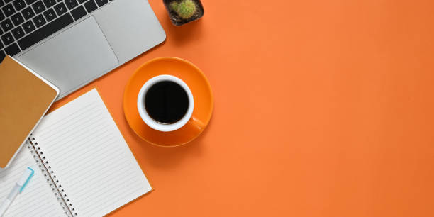 istock Top view image of Colorful working table. Flat lay Computer laptop, Cactus, Notebook, Diary, Pen and Coffee cup. Colorful workplace concept. 1213244257