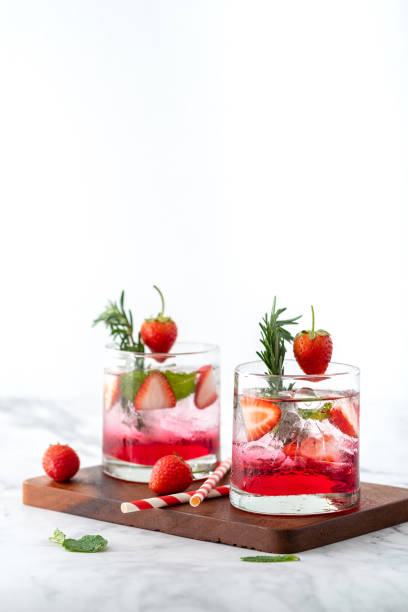 Summer strawberry drink on marble white background.