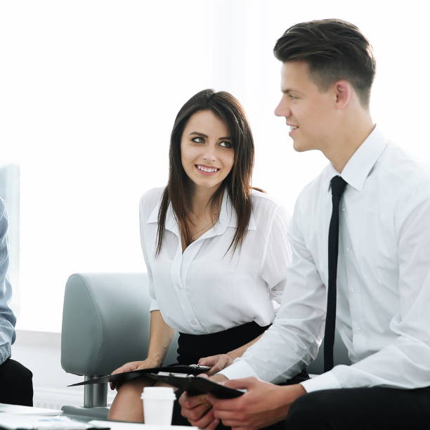 istock business team looking at laptop while sitting at your Desk 1213255057