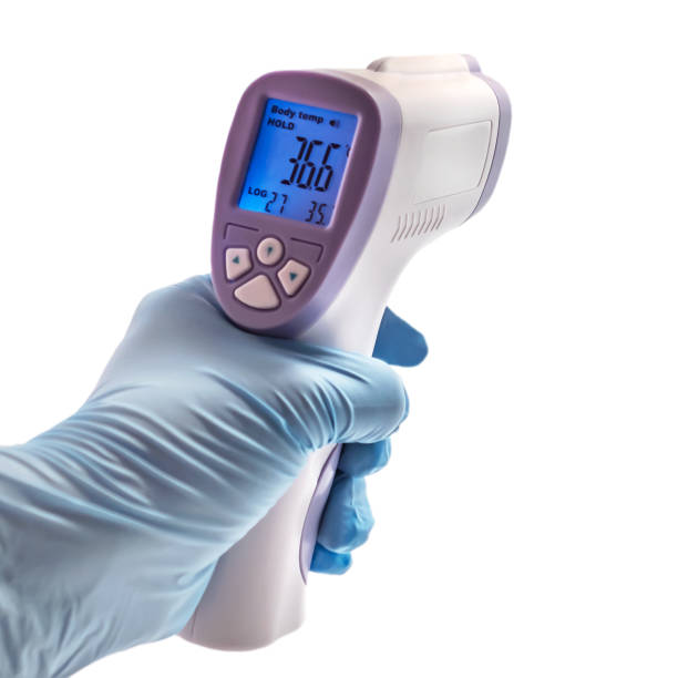 termómetro infrarrojo digital sin contacto isométrico medical. dispositivo de medición de temperatura - instrumento de medida fotos fotografías e imágenes de stock