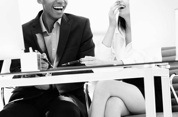 istock blurred image of a cheerful business team in the workplace. 1213258488
