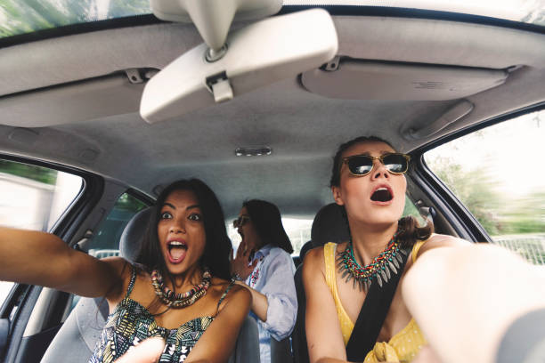 istock Girls in a car 1213259832