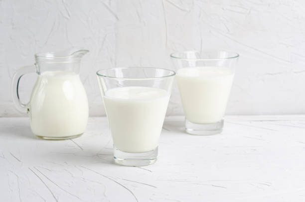 istock Homemade fermented beverage - kefir on a white background with copy space, place for text. 1213262529