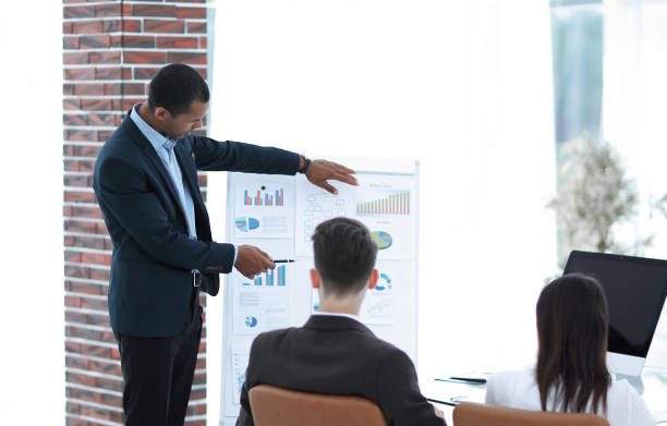 istock speaker makes a report on the presentation of the financial project 1213265478