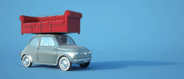 3D rendering of a small retro car carrying a big red sofa