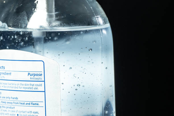 Ultra Close-Up Macro Artsy Shot of Antiseptic Gel Hand Sanitizer Label Purpose with Alcohol and Aloe Vera Bubbles To Prevent the Spread of COVID SARS nCoV 19 Coronavirus Swine Flu H7N9 Influenza Illness During Cold and Flu Season stock photo ultra close-up macro artsy shot of antiseptic gel hand sanitizer label purpose with alcohol and aloe vera bubbles to prevent the spread of covid sars ncov 19 coronavirus swine flu h7n9 influenza illness during cold and flu season stock photo photo