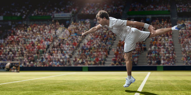 professional male tennis player in mid air serving on grass - volleying sport summer men imagens e fotografias de stock