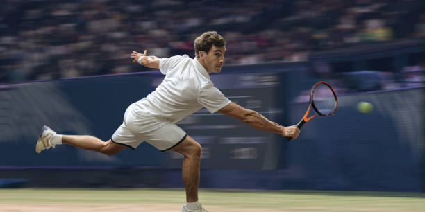 professional male tennis player in mid motion on grass court - sports motion blur imagens e fotografias de stock