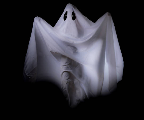 istock Scary white ghost at fire flame eye on a black background for Halloween concept 1213269464