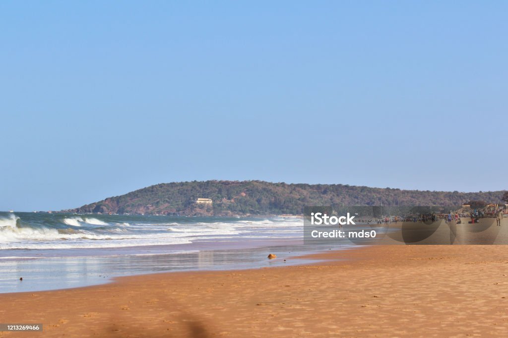 Calangute Beach, Goa Calangute is the most popular beach in North Goa & visited by thousands of domestic & international tourists, offers water sport activities like parasailing & water skiing. Beach Stock Photo