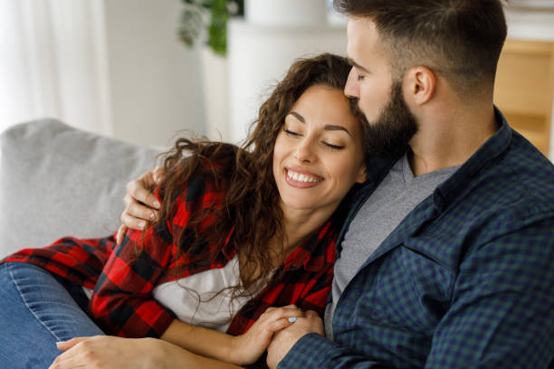 istock Affectionate young couple enjoying each other on leisure day at home 1213269742
