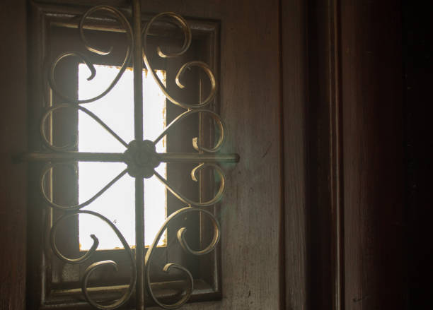 istock Little window on a main entrance door for safety issues 1213272093