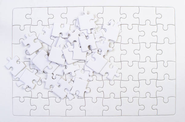 istock White jigsaw puzzles put together Business idea 1213272756