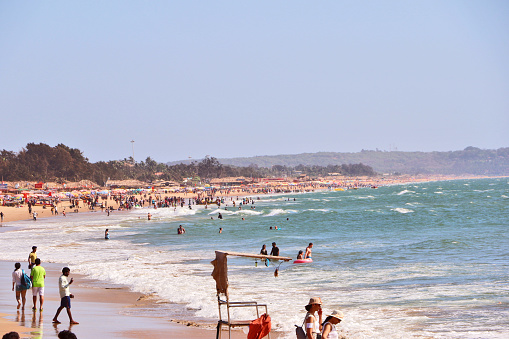 Goa, India – March 12, 2020: Calangute is the most popular beach in North Goa & visited by thousands of domestic & international tourists, offers water sport activities like parasailing & water skiing.