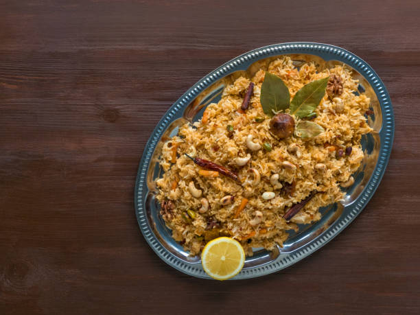 istock Traditional Arabic Basmati rice with vegetables. Arabic cuisine. Vegetable Biryani. Top view, copy space 1213275474