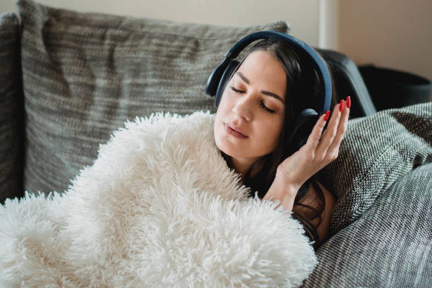 istock Woman with headphones 1213275505