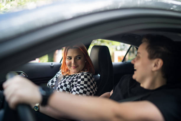 istock Friends having fun inside the car 1213277602