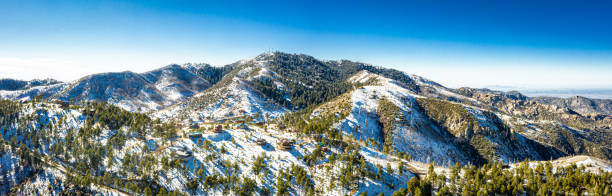 A panorama aerial image of the summit of Mt. Lemmon outside of Tucson, Arizona covered in snow stock photo