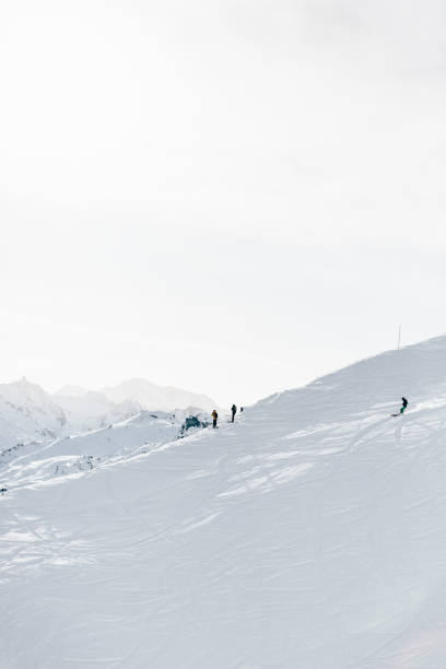 istock Skiers exploring mountains at Maribel in The Three Valleys 1213281431