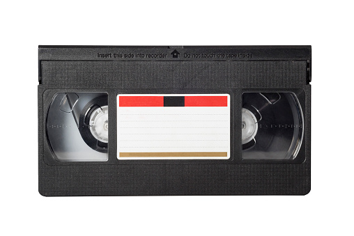 VHS video tape isolated on white background. Close-up