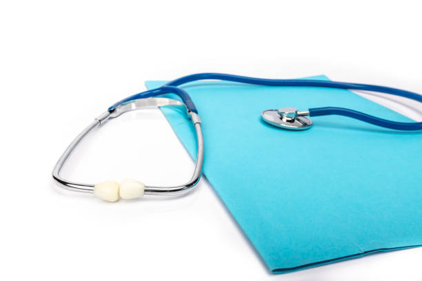 istock medical record and blue stethoscope close-up on white background 1213289332
