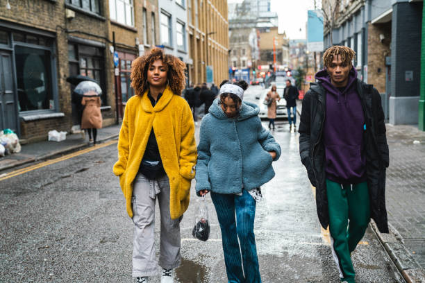 istock Hip friends walking in the city 1213297866