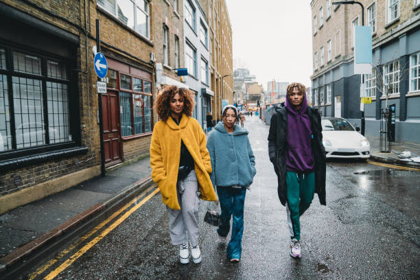 istock Hip friends walking in the city 1213297873