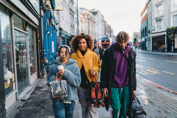 istock Hip friends walking in the city 1213297921