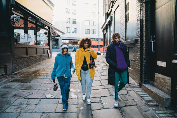 istock Hip friends walking in the city 1213297922