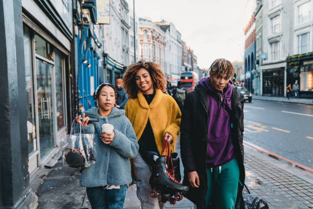 istock Hip friends walking in the city 1213297930