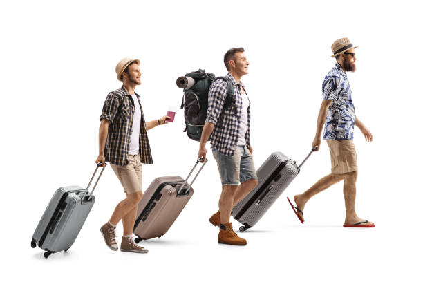 istock Male tourists with suitcases 1213298687