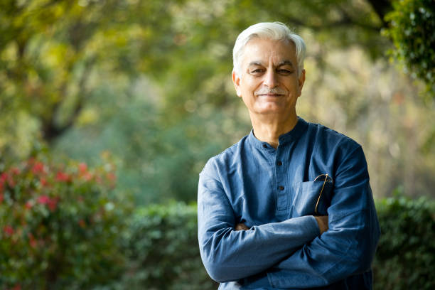 istock Happy senior man at park 1213303059