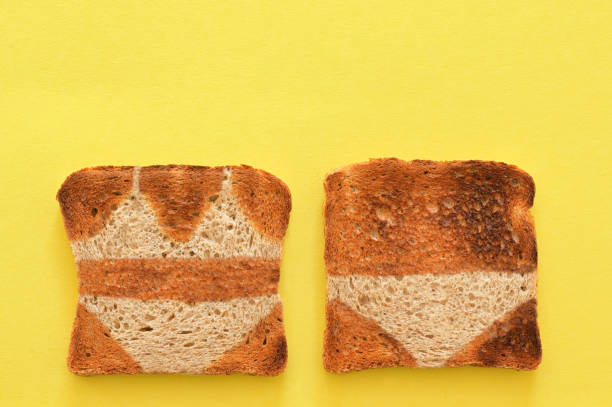 Abstract Crusty Bread Toast Slice And Summer Tan Lines stock photo