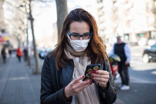 istock Woman with mask against Coronavirus. 1213304548