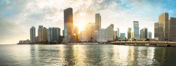 istock Panorama of Brickell, Miami's financial centre, with sun going down between the skyscrapers 1213305676