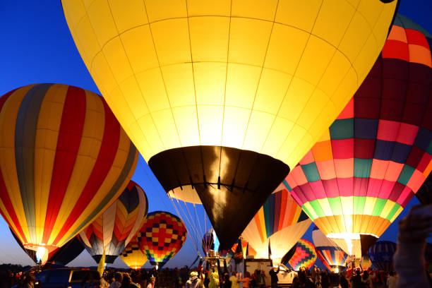 Balloons at Night Glow Hot air Balloons at Night Glow in Albuquerque, New Mexico ballooning festival stock pictures, royalty-free photos & images