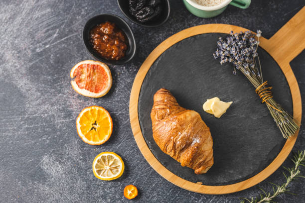 istock Croissant and marmalade 1213309296