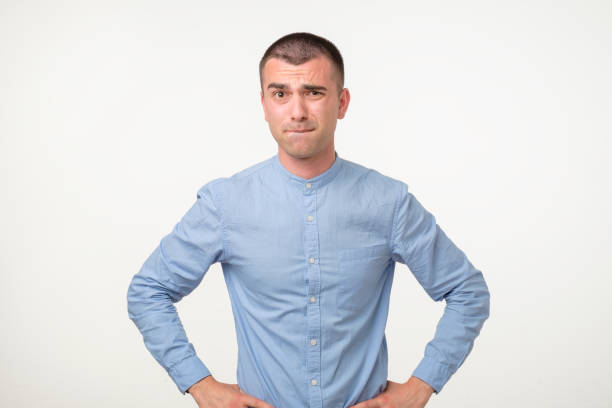 istock Thoughtful hispanic young man trying to find a right solution generating idea 1213309745