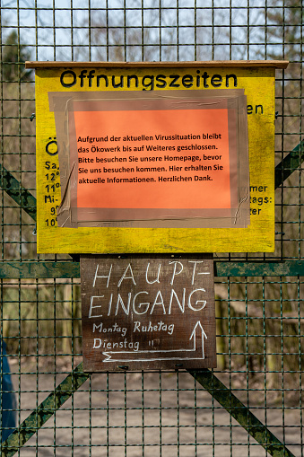 Oekowerk, Teufelsseechausee, Berlin, Germany - march 18, 2020: sign telling the visitors centre is closed due to the Corona virus