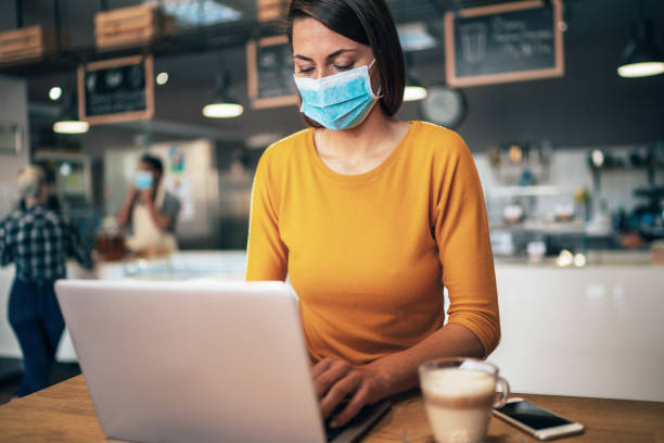 istock Woman with face protective mask 1213316682