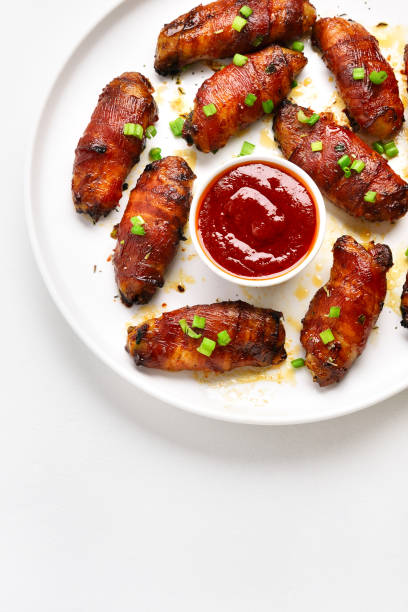 istock Bacon wrapped grilled chicken wings 1213318639