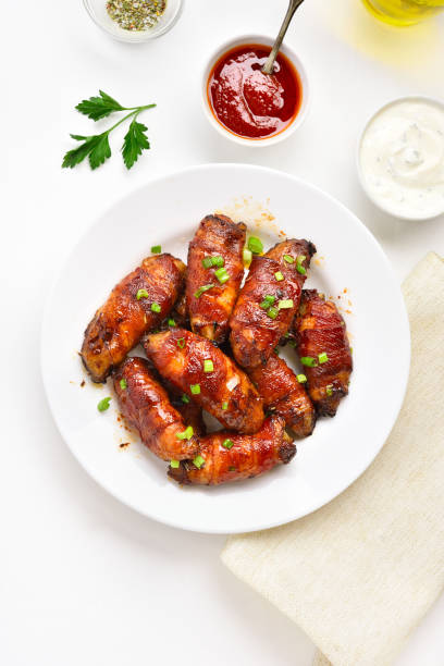 istock Bacon wrapped grilled chicken wings 1213319361