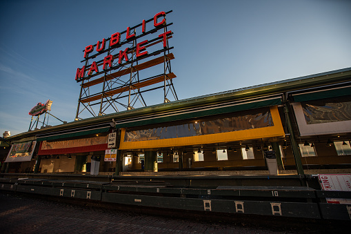 A usually exceptionally crowded and lively marketplace, Pike Place in Seattle is a ghost of its former self, shuttered and empty.