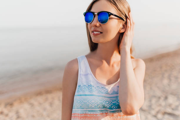 istock Young girl posing standing on the beach on a Sunny day 1213331761