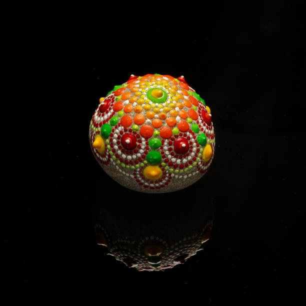 istock Beautiful hand painted mandala rock 1213332927